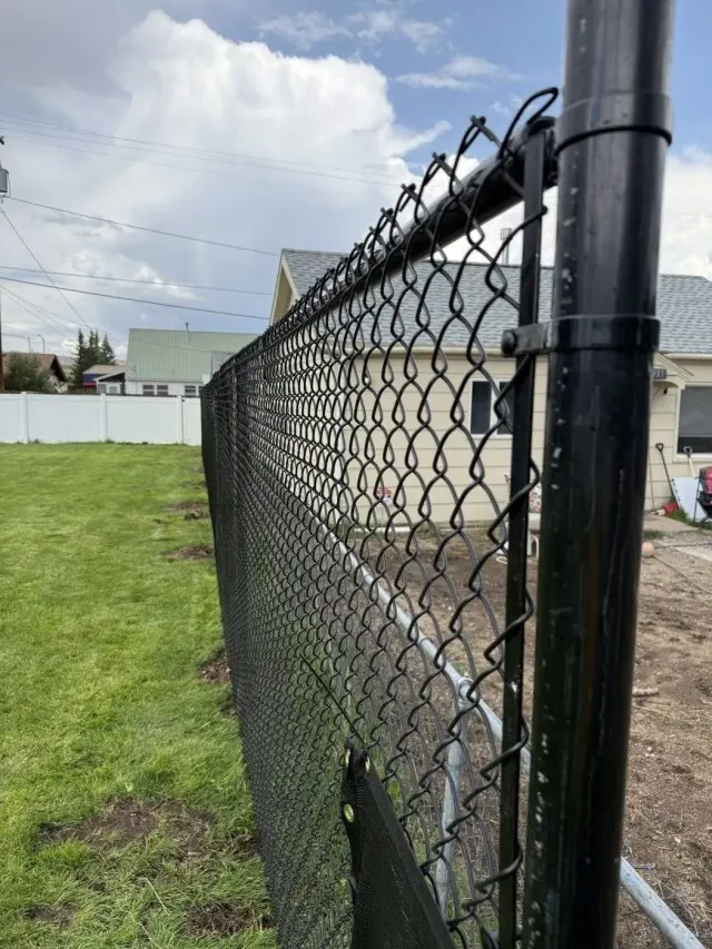 Black Chain Link Fence in Butte, MT by DB Builders
